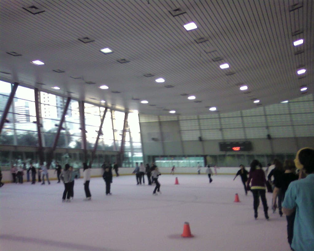 Skaters on the indoor ice rink at Yerba Buena Ice Skating and Bowling Center